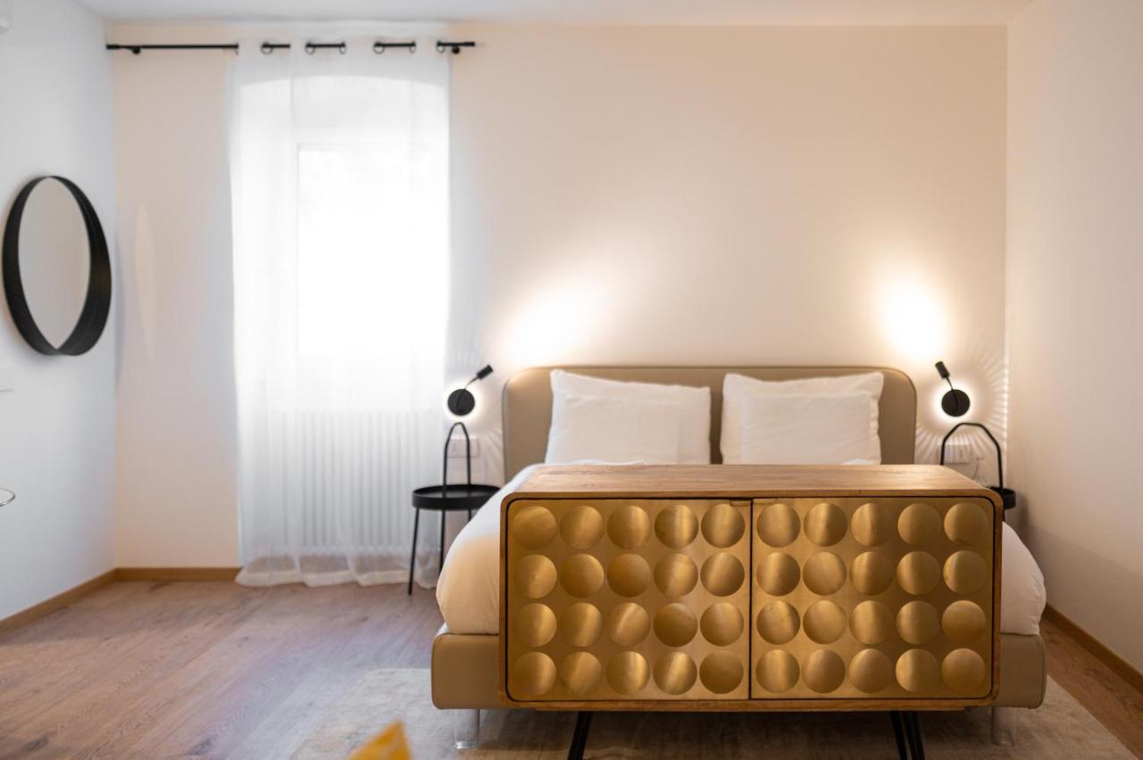 Guesthouse Diwine Merano Exteriér fotografie A bedroom